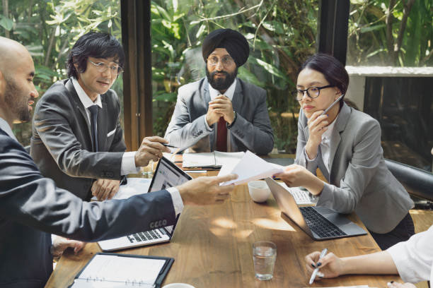 People are sitting in Meeting and discussing on something